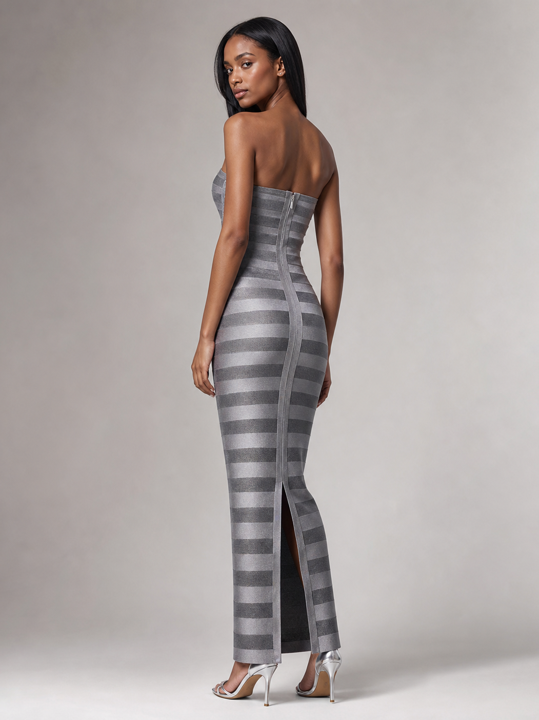 Silver Horizon Strapless Column Dress in metallic striped fabric; fitted silhouette, back zipper.