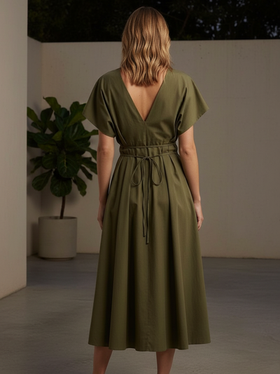 Back view of olive green drawstring waist kimono maxi dress; V-back, short sleeves, thin tie belt, flowing A-line skirt.