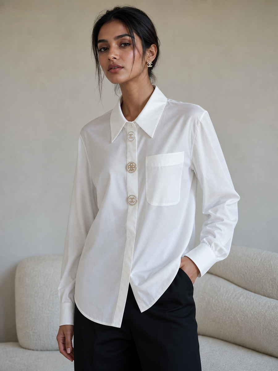 Branded plain white cotton shirt, button-down with front pocket and decorative logo buttons.