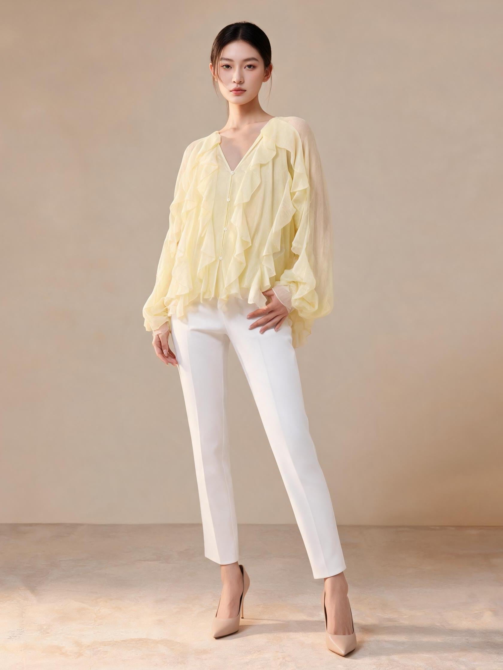 Ruffles V-neck full-sleeve top in pale yellow with cascading ruffles