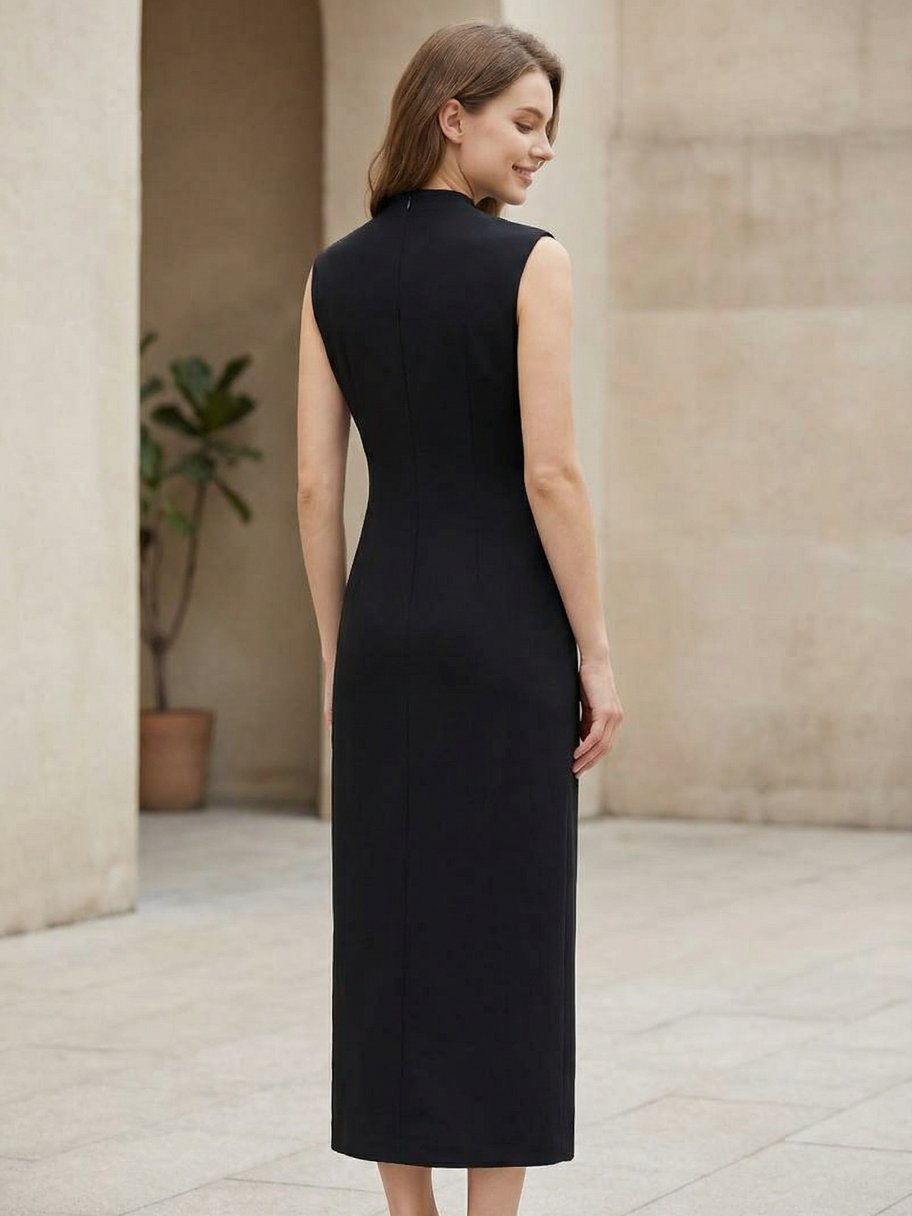 Crystal Clasp Cutout Column Midi Dress by Exclusives; black sleeveless midi dress.