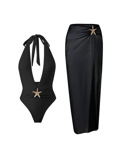 Black halter-neck bikini top with starfish charm; black sarong wrap skirt with starfish detail.