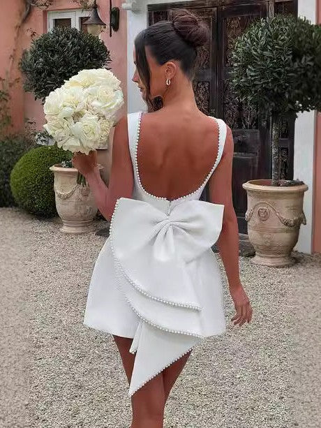 white dress with bow on back Confte 15% Elastane Jane is 58 and wears a UK Size 8 White Dress For Bridal Shower