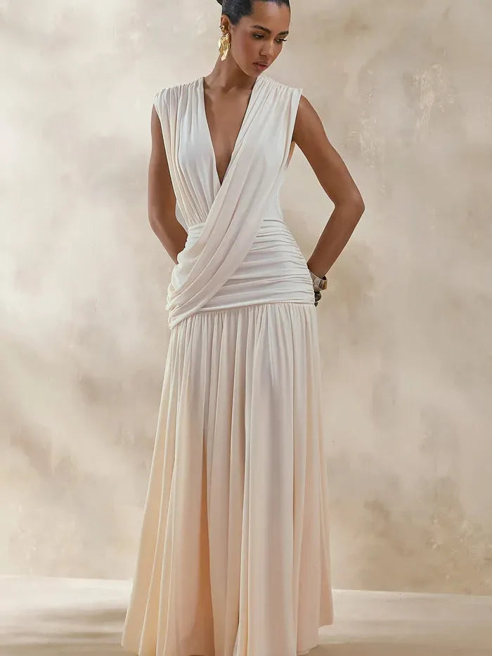 Sienna Draped Maxi Dress in cream with a wrap draped bodice and plunging V-neck.