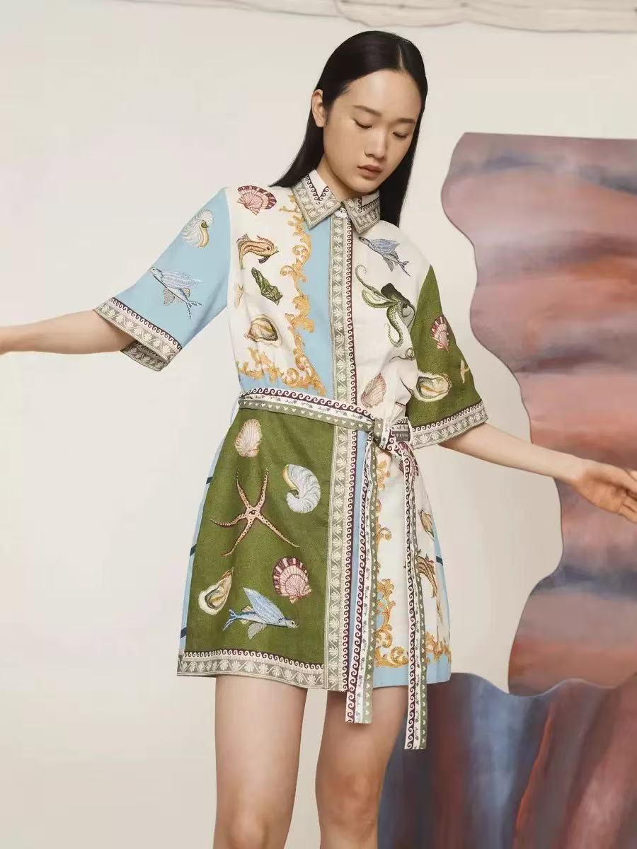 Sea Life Patchwork Belted Shirt Mini Dress in blue and olive-green patchwork with seashell prints and waist tie.