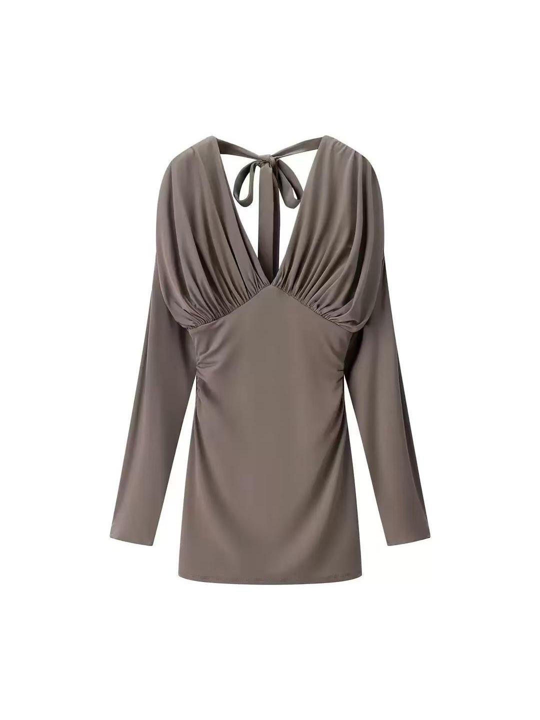 Taupe satin mini dress with a deep plunging V-neck, ruched bust, long sleeves, and back neck-tie closure