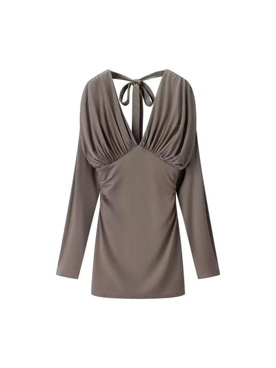 Taupe satin mini dress with a deep plunging V-neck, ruched bust, long sleeves, and back neck-tie closure