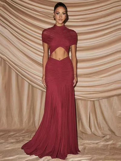 Twisted Cutout High-Neck Maxi Dress by Exclusives, wine red ruched fabric with waist cutout and floor-length skirt.