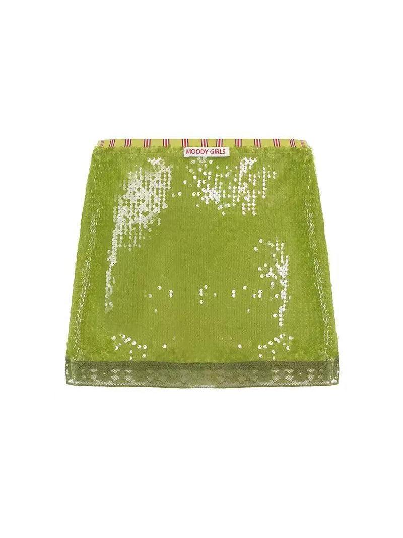 Lime-green sequin mini skirt with a lace-trimmed hem and striped waistband; Moody Girls label at the center.