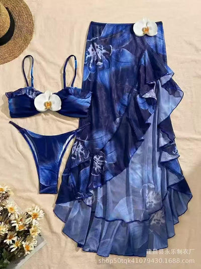 Orchid Tide Ruffle Swimsuit Set—blue bikini top and bottom with a sheer blue cover-up by Exclusives