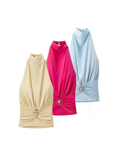 Three ruched jewel-detail halter tops in beige, hot pink and light blue.