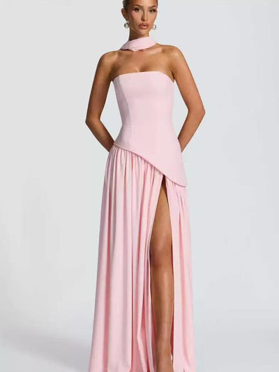 Light pink strapless tube maxi dress with an asymmetric draped overlay and high slit, plus a matching neck scarf