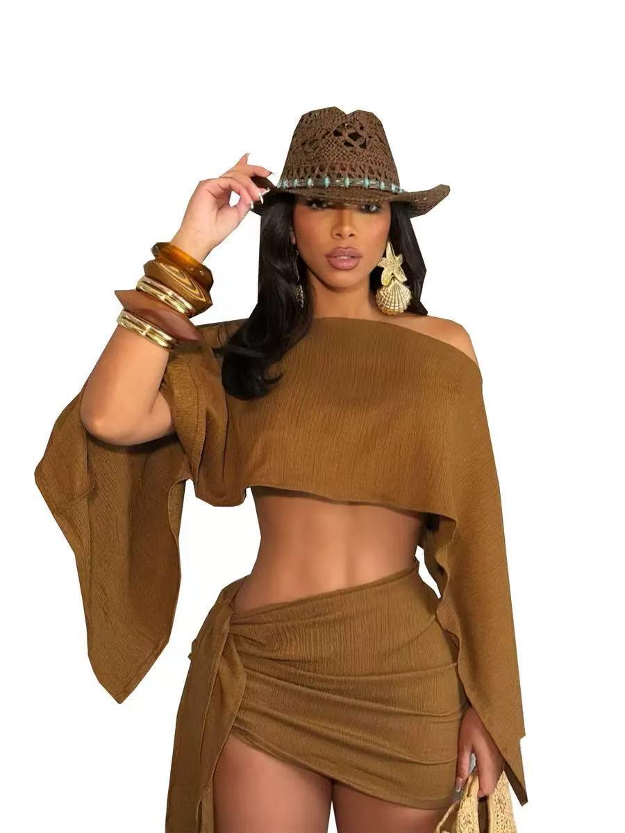 Desert Muse Draped Beachwear Co‑ord Set by Exclusives, brown off-shoulder two-piece with matching ruched skirt.