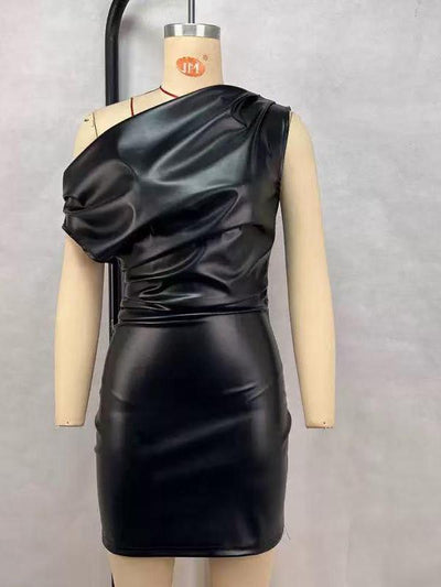 One-shoulder black faux-leather mini dress with a draped bodice and fitted skirt on a mannequin.
