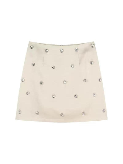 Beige satin mini A-line skirt with scattered clear crystal rhinestones.