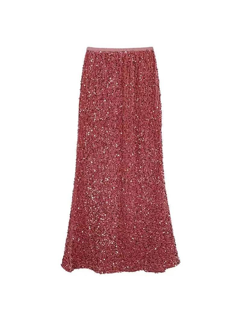 Rose-pink sequin maxi skirt with a light pink waistband, floor-length and fully covered in shimmering sequins.