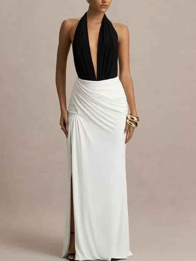 Plunge Halter Ruched Maxi Dress by Exclusives; black halter bodice with white ruched skirt and side slit