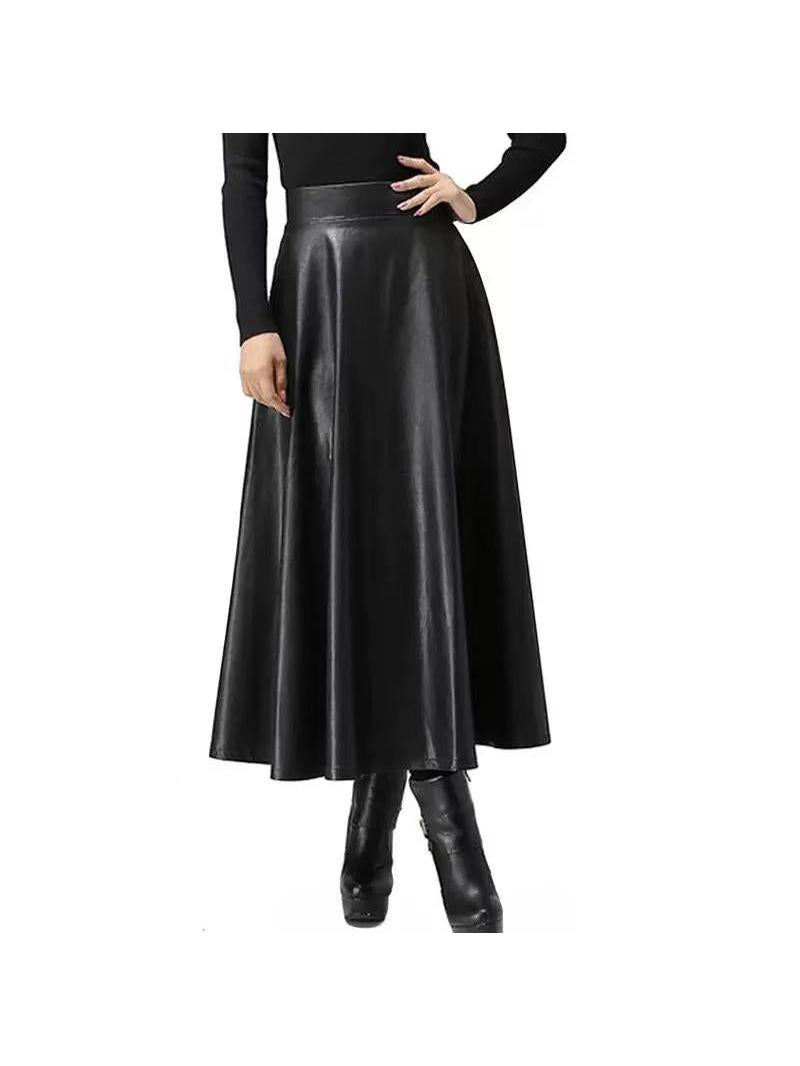 Black faux-leather flared maxi skirt with a wide waistband, worn by a model with a black top and knee-high boots.