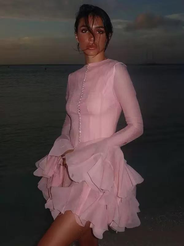 Élodie Blush Mini Dress by EXCLUSIVES, blush pink sheer long sleeves with tiered ruffle mini skirt.
