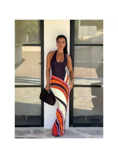 Sunset Wave Maxi Dress by Exclusives; black halter top with multicolor sunset-wave print skirt.