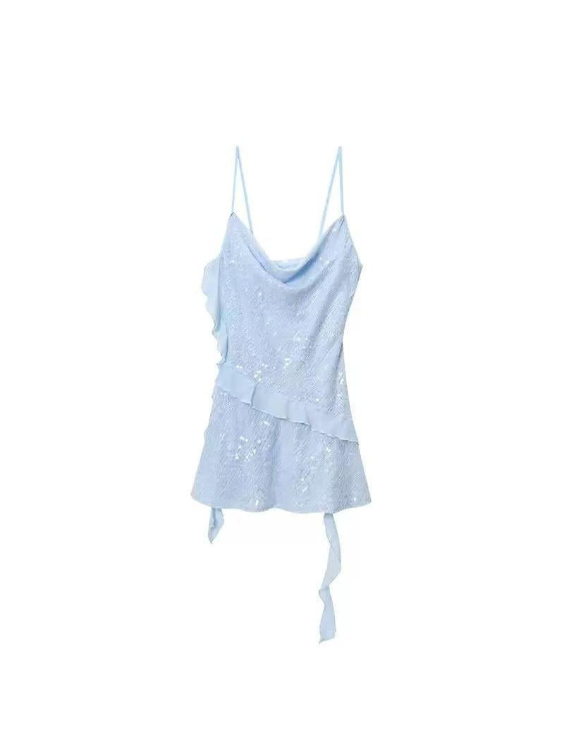 Pale blue sequined mini dress with thin spaghetti straps, draped cowl neckline, asymmetrical waist ruffle, and fabric ties at the hem.