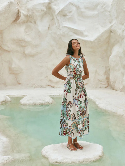 Paisley Garden Sleeveless Maxi Dress on sale by Exclusives; white base with blue-green paisley print, sleeveless maxi