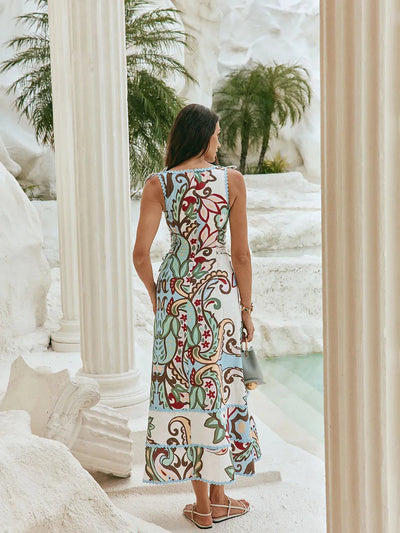 Paisley Garden Sleeveless Maxi Dress by Exclusives; blue-green paisley print, sleeveless, floor-length.