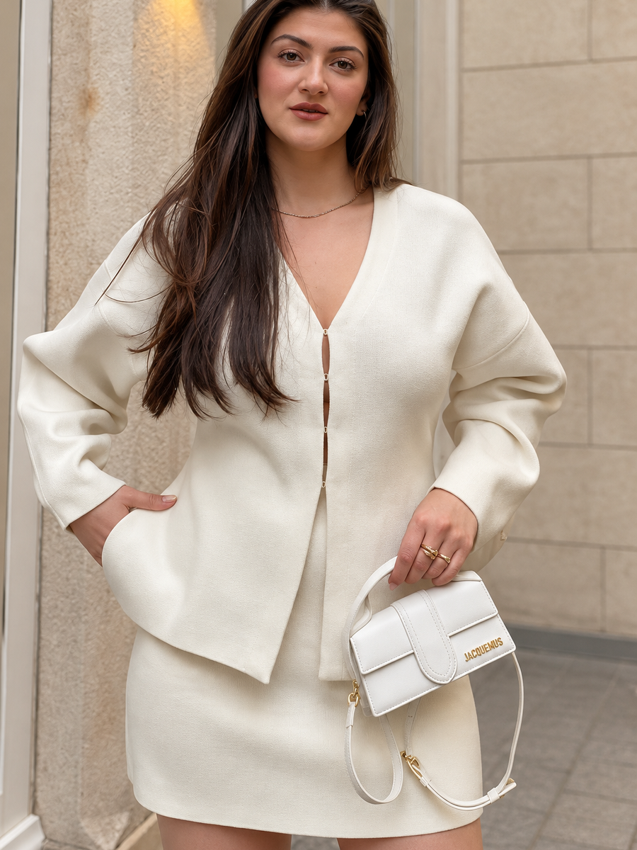 Minimalist V-Neck Jacket & Skirt Co-Ord Set in ivory with a Jacquemus bag