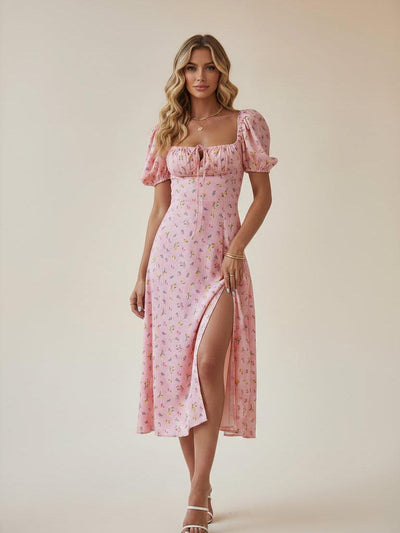 Floral Print Slit Maxi Dress in pink with puff sleeves, tie-front neckline, and floral pattern.