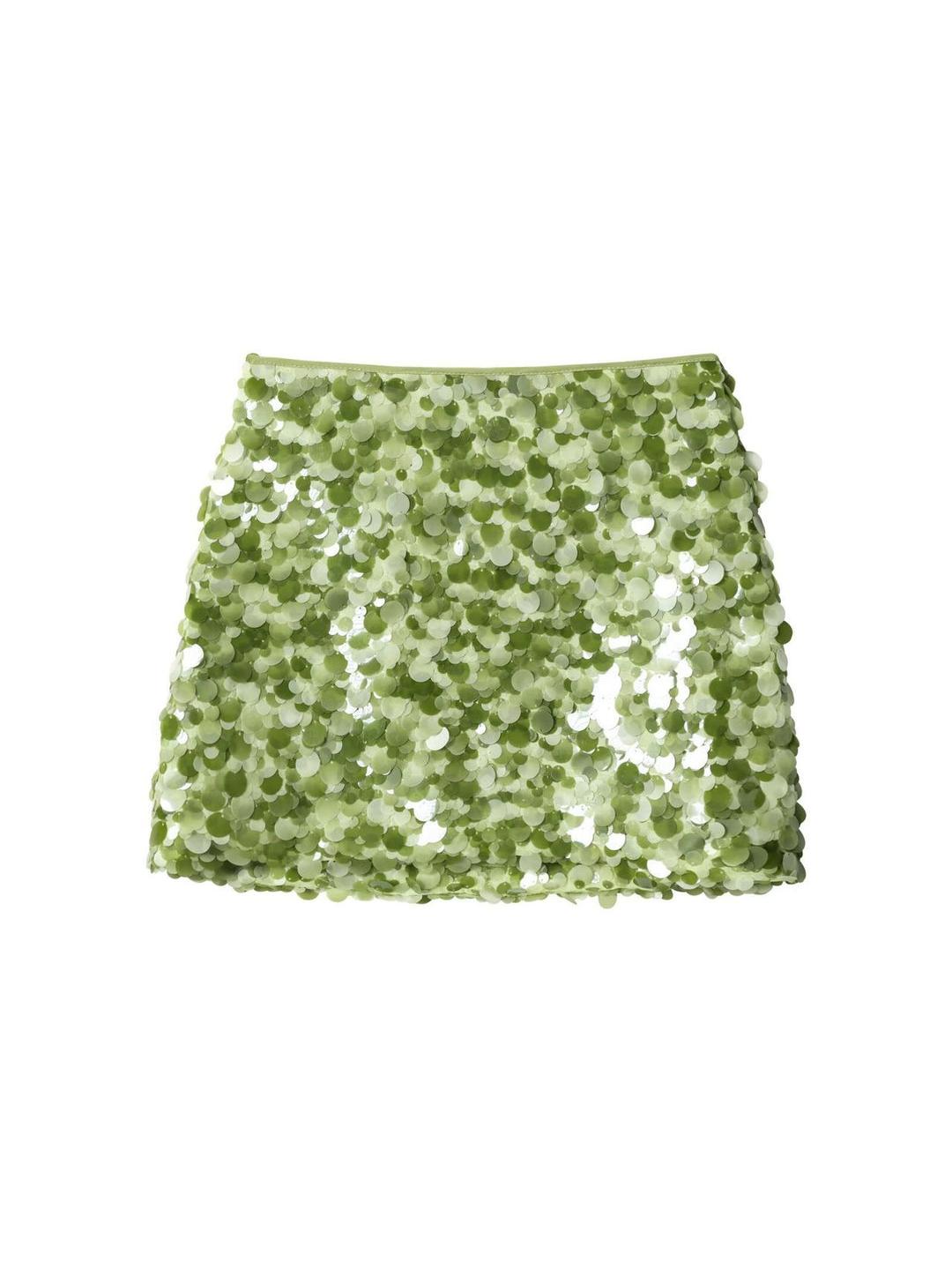 Lime-green mini skirt covered in shiny round coin sequins.