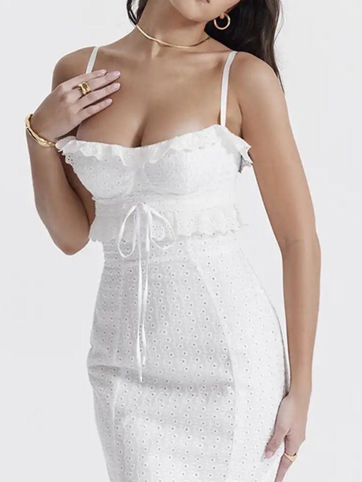 White Seraphine Ruffle Eyelet Maxi Dress by Exclusives with a ruffled neckline, tie waist, and spaghetti straps
