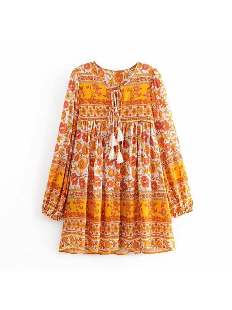 Floral printed flare short dress by SR Store in orange and yellow with tassel-tie neckline and long sleeves