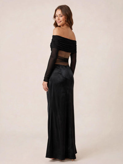 Off-Shoulder Cutout Maxi Dress in black with ruched bodice and sheer mesh midsection, long sleeves.