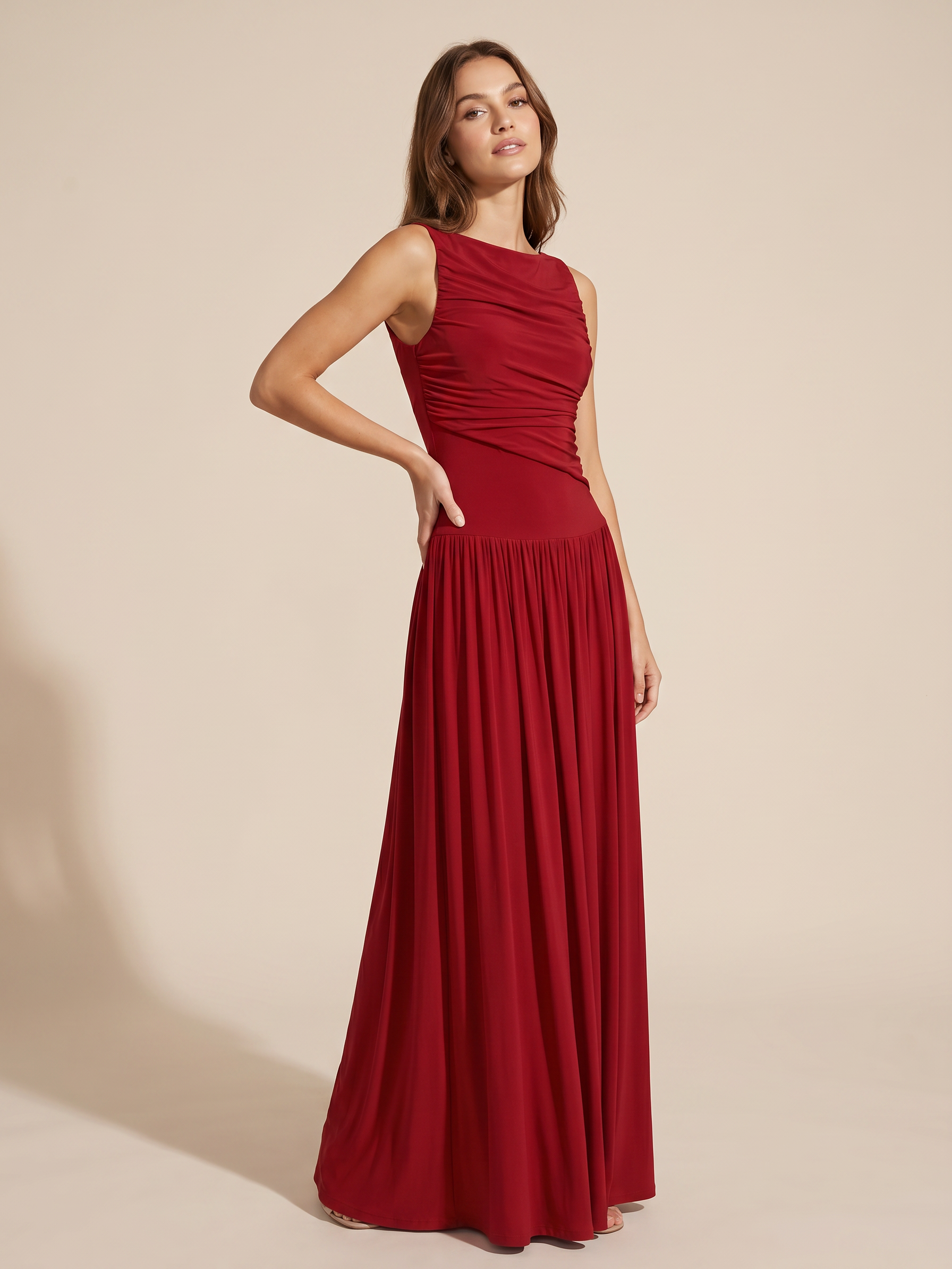 Sleeveless Ruched Maxi Dress by EXCLUSIVES in burgundy with a pleated floor-length skirt.