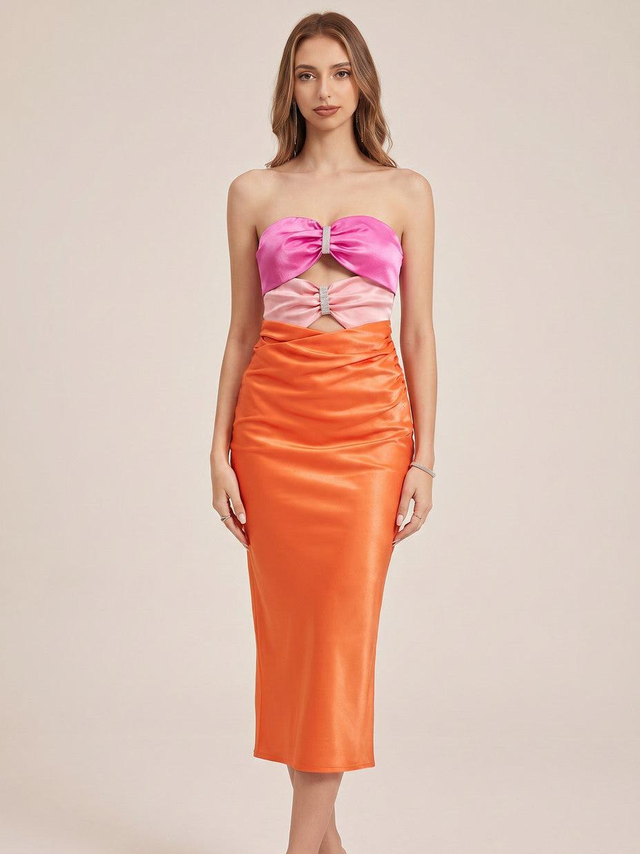 Bodycon satin dress with pink strapless cutout tube top and orange ruched midi skirt