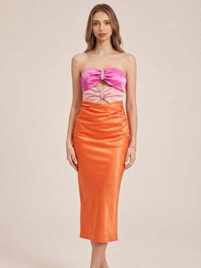 Bodycon satin dress with pink strapless cutout tube top and orange ruched midi skirt
