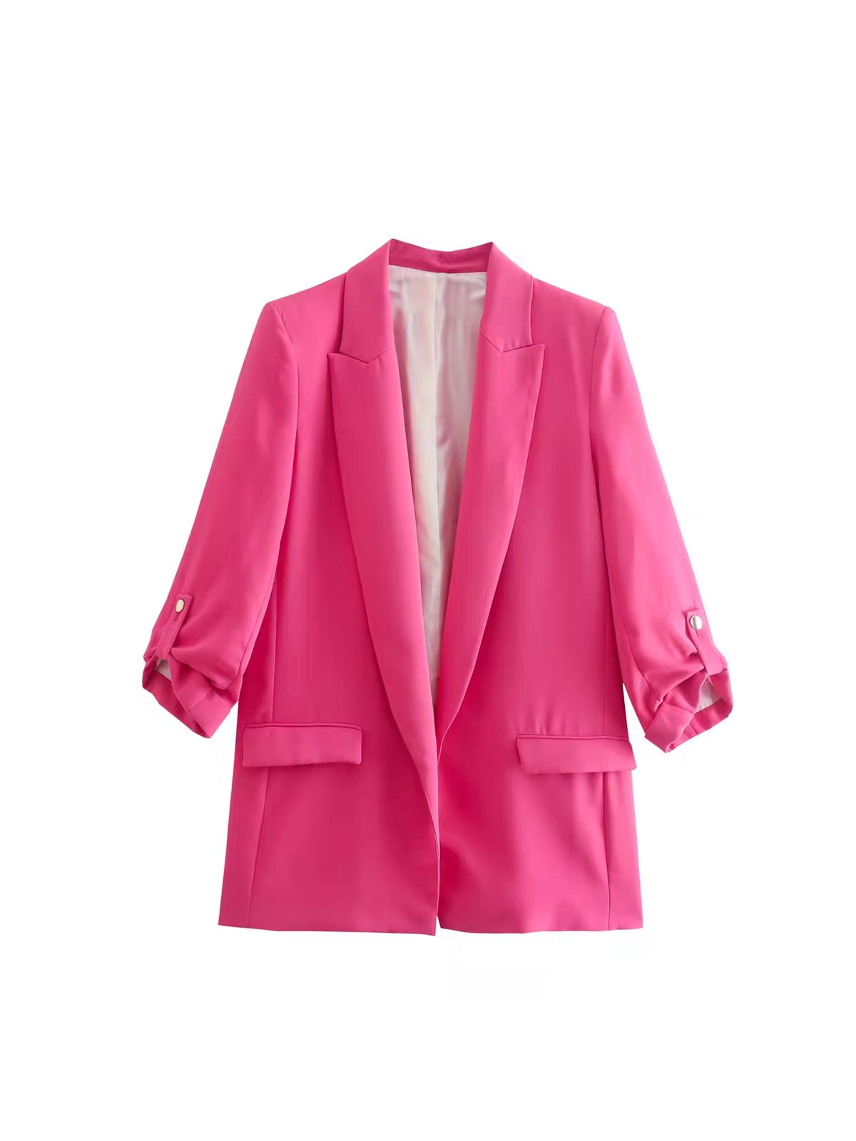 Bright pink blazer with folded sleeves, notched lapels, two flap pockets, light interior lining.