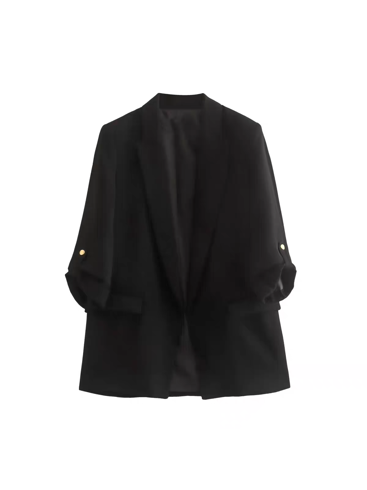 Black blazer with folded sleeves and gold button cuffs, open-front, oversized silhouette.