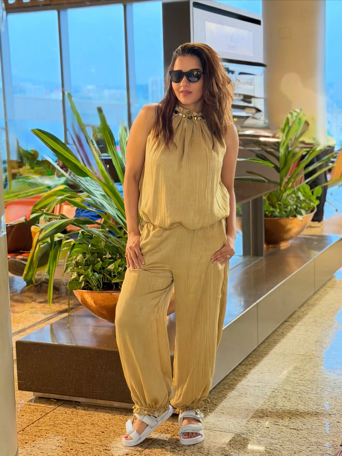 Nerissa Resort Co-ord Set by EXCLUSIVES; beige sleeveless top with matching elastic-cuff pants.