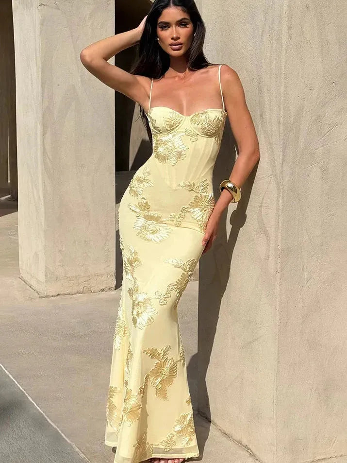 Pale yellow floral jacquard mermaid maxi dress with a sweetheart corset bodice and slim spaghetti straps.
