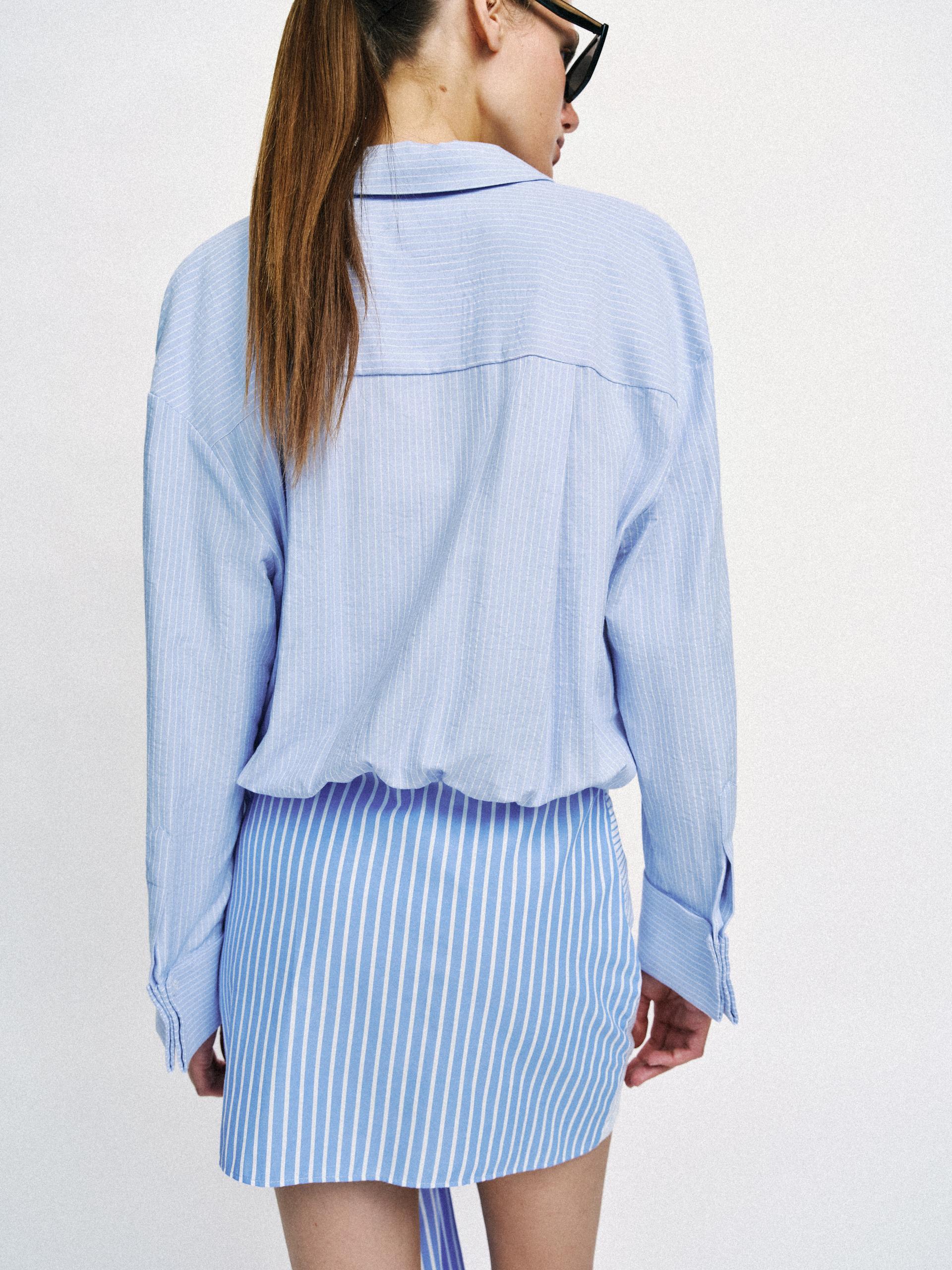 City Stripe Twist Shirt Dress by Exclusives, blue and white striped, back view on model