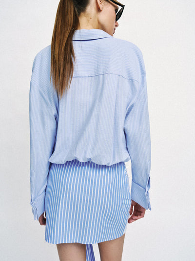 City Stripe Twist Shirt Dress by Exclusives, blue and white striped, back view on model
