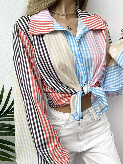 Multicolor striped lapel-collar top, tied at the waist, lantern sleeves, blue, pink, yellow, red and black stripes.