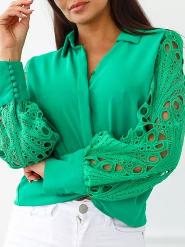 Emerald green oversized shirt with crochet hollow-out sleeves, circular pattern, and buttoned cuffs.
