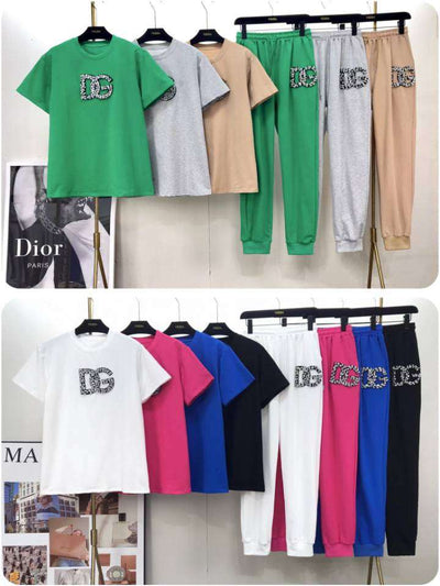 Two rows of DG diamond-studded logo tees with matching jogger pants in green, gray, beige, white, pink, blue.